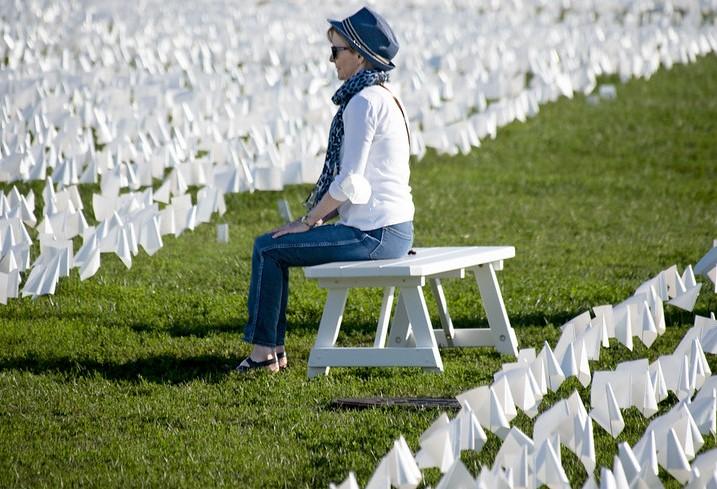 Woman visiting cemetery